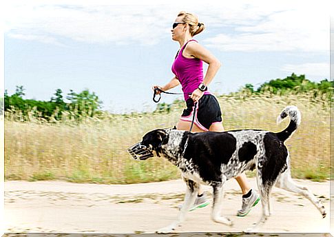 woman running with dog