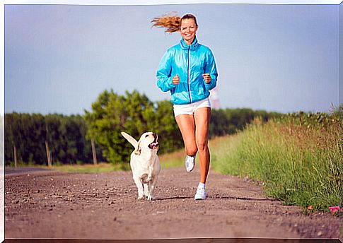 woman running with dog